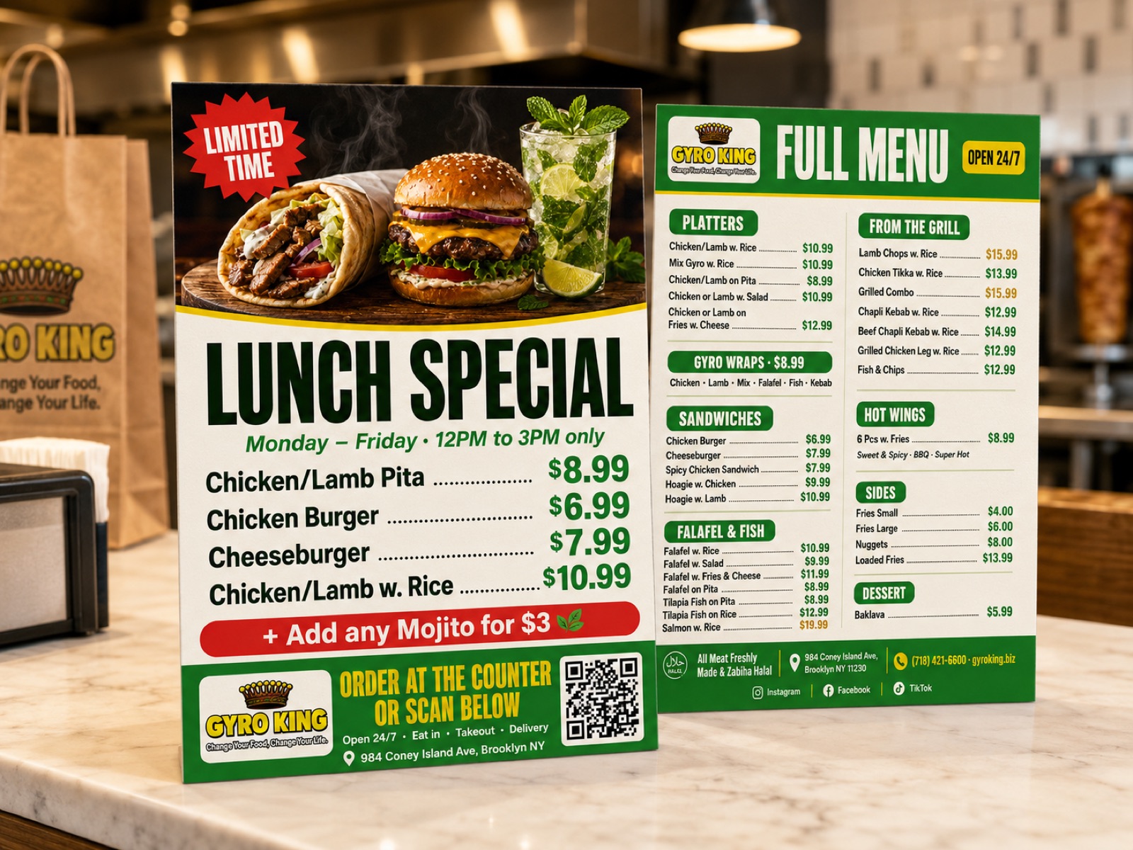 A Gyro King Lunch Special flyer and a Full Menu flyer we designed, standing on a marble counter, with the menu split into clear green-headed sections such as Platters, From the Grill, Sandwiches and Sides